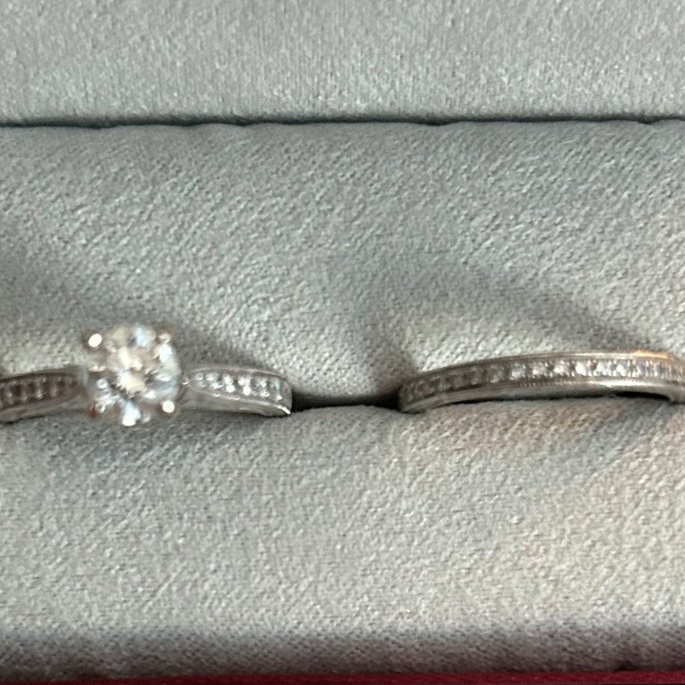 14k white gold round diamond engagement ring and matching wedding band set.